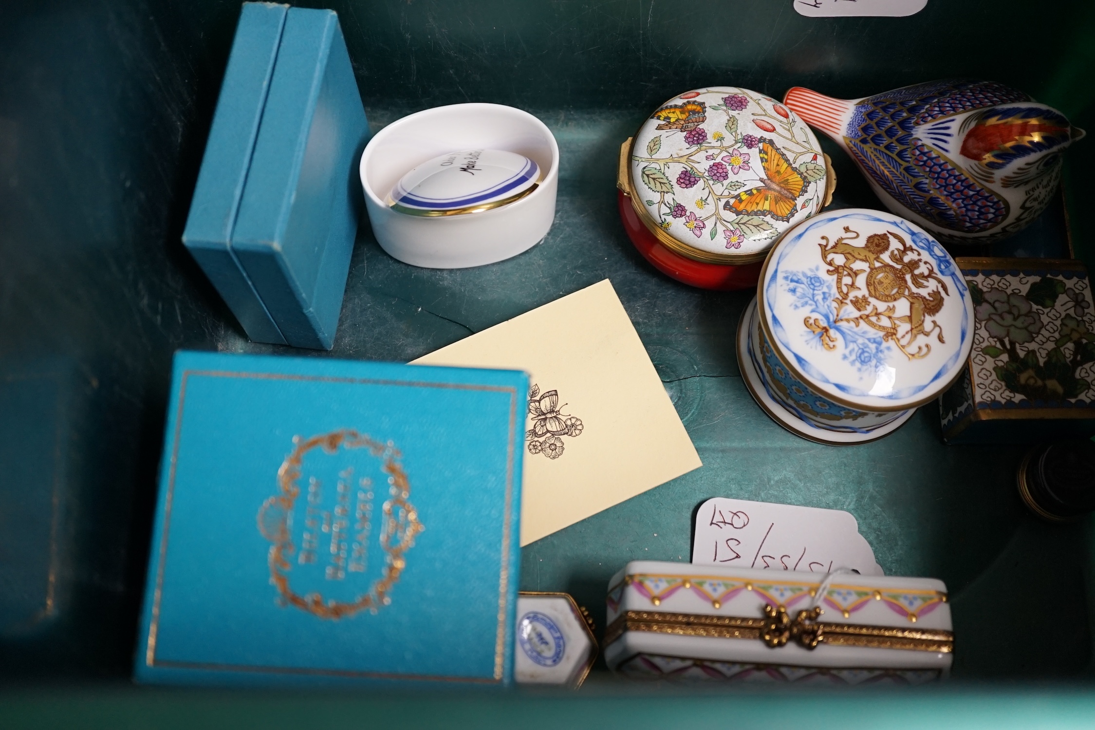 A collection of curios to include Halcyon Days, Bilston and Limoges enamel boxes, a Chinese champleve enamel box, a Royal Crown Derby bird, etc. largest 16cm wide